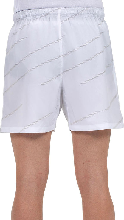 A person wearing Bullpadel Cabanas Mens Padel Shorts - White, shown from waist to above the knees. The image highlights the fit and features Bullpadel's Quickerdry technology for comfort during play.