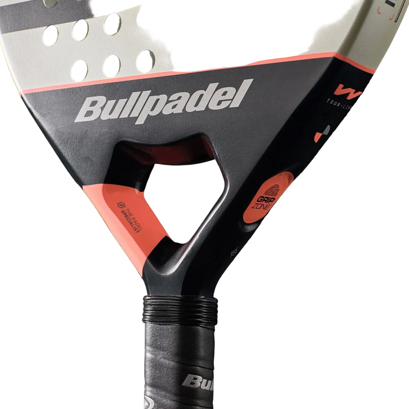 Close-up of the Bullpadel Indiga W 2026 padel racket, featuring its brand name, lightweight performance grip with black wrap, and a perforated surface with black, white, and orange accents against a black background.