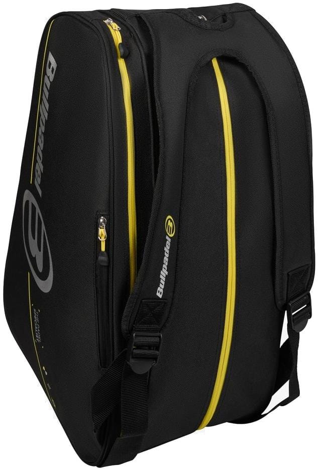 The Bullpadel BPP26015 Tour 2026 Padel Racket Bag in black features yellow accents, two large zippered compartments, adjustable shoulder straps, and visible Bullpadel branding—ideal for carrying your padel racket and gear.