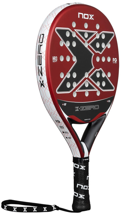 The NOX X-Zero Red Padel Racket has a striking red and black design with a bold “X” on the face, white accents, and a comfortable grip—ideal for beginners seeking control from the trusted NOX brand.