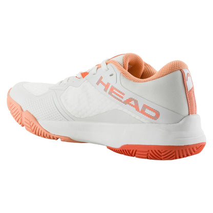 The HEAD Motion Team Women's Padel Shoes in white and coral, shown from a rear-side angle, are crafted for stability and comfort with mesh and synthetic materials. An orange sole provides multi-directional grip, with "HEAD" displayed in orange on the side.
