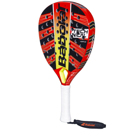 The Babolat Technical Vertuo Padel Racket in red and black, featuring yellow accents and a white grip, prominently displays "Technical Vertuo" on its surface. Engineered for effortless power, it includes multiple holes to absorb vibrations and comes with an elegant black wrist strap for enhanced security.