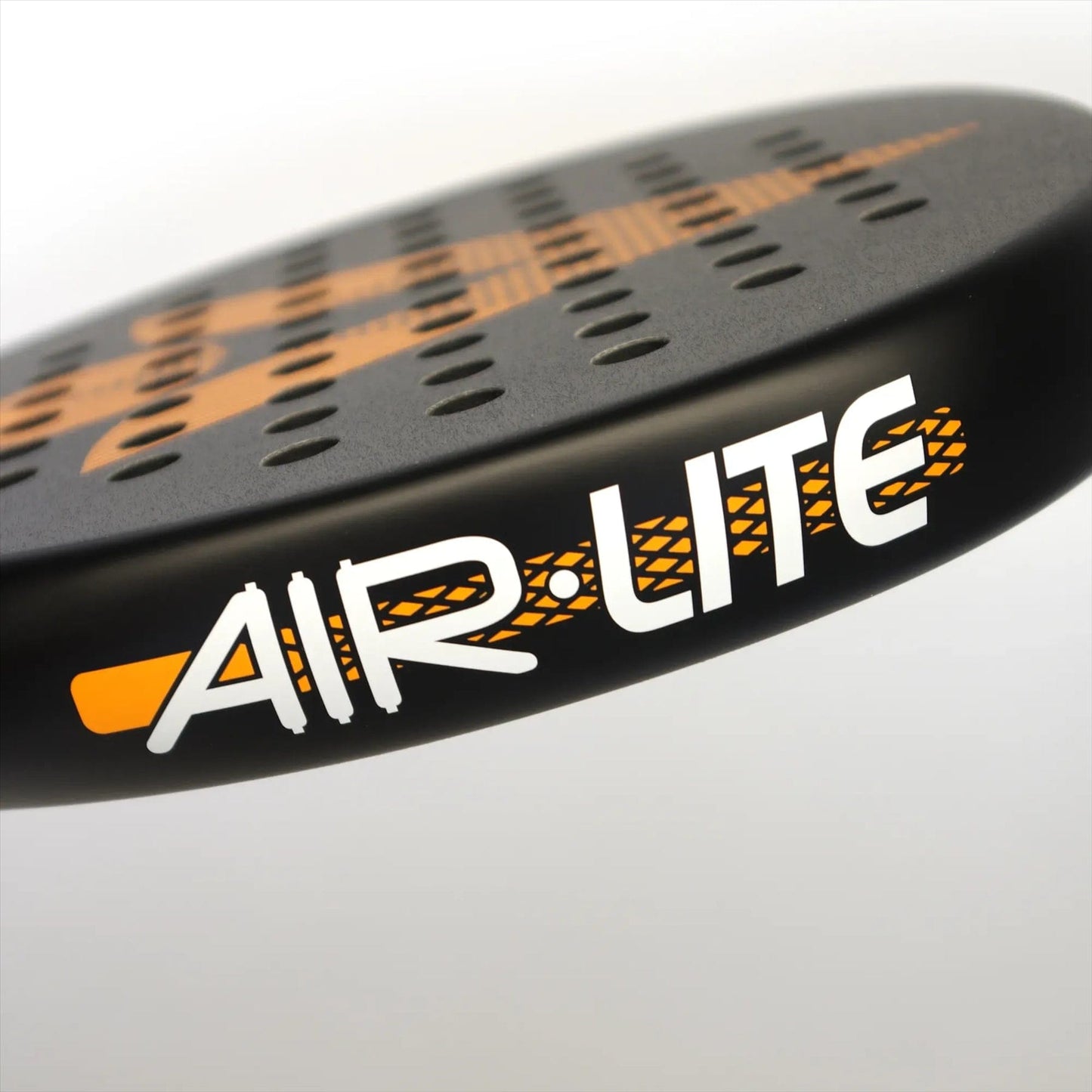 Close-up of the Karakal Air Lite 345 Orange Padel Racket by Karakal, showing its black teardrop shape, perforated holes, orange accents, and "AIR LITE" text in bold white and orange lettering.