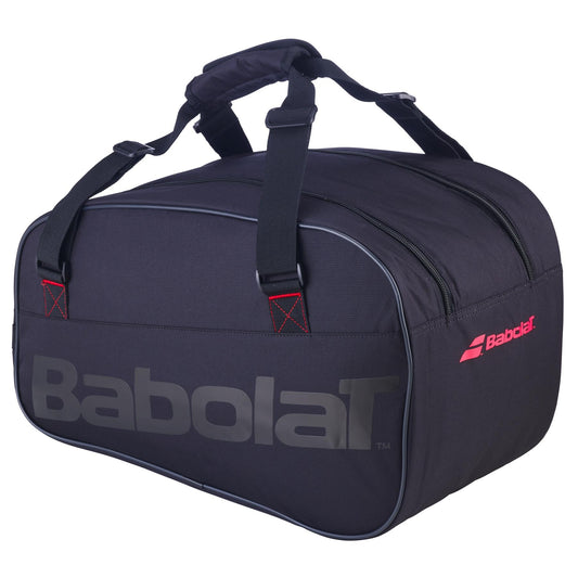 The Babolat RH Padel Lite Racket Bag in black boasts two compartments and ergonomic shoulder straps. Offering a 35L capacity, it is constructed from recycled PET material. The side of the bag prominently features the gray Babolat logo, complemented by a smaller red logo positioned near the zippered opening.