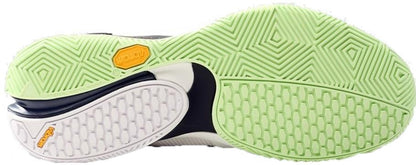 Close-up of the Bullpadel Hack Vibram 26V Mens Padel Shoes outsole in white, showing light green and white rubber with yellow Vibram branding. The tread has geometric and hexagonal patterns for superior grip.
