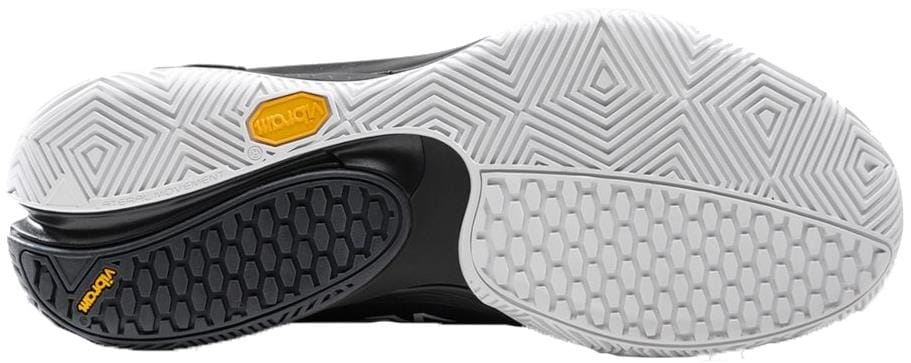 Close-up of the Bullpadel Vertex Vibram 26V Mens Padel Shoes outsole, highlighting the black and white geometric tread pattern and two yellow Vibram logos. Brand: Bullpadel.