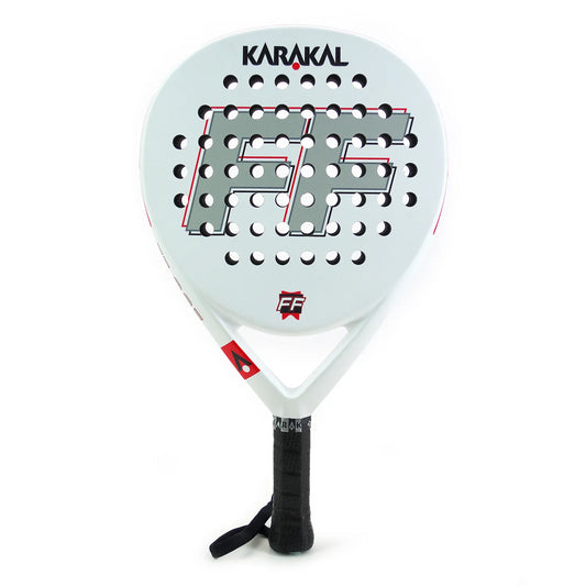 The Karakal FF 365 Padel Racket in white is tailored for intermediate players, showcasing numerous circular perforations and equipped with a black grip handle. Its design includes prominent "FF" letters alongside the "Karakal" brand name on its surface, and it features a convenient wrist strap at the base.