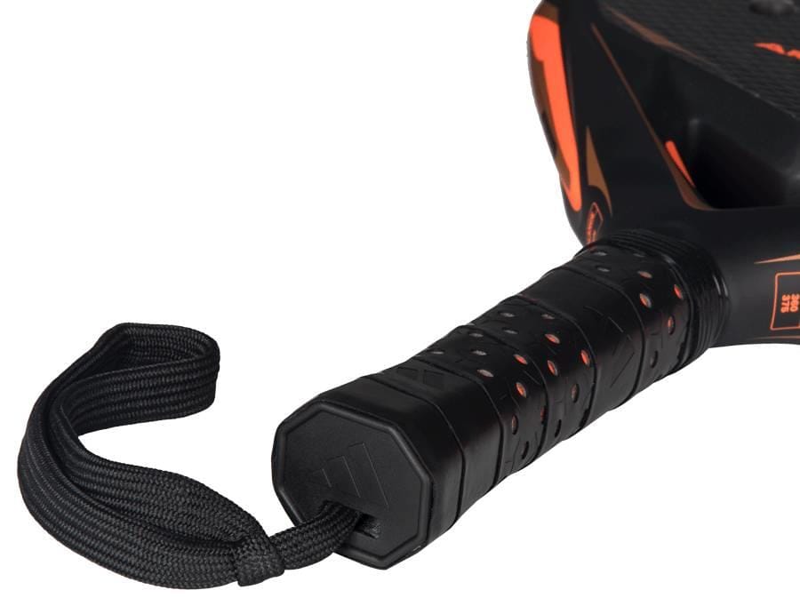 Close-up of the adidas Arrow Hit CTRL 2026 Padel Racket handle in black and orange, showing a black wrist strap, textured grip, perforations, and an intelligent balance system for enhanced control.