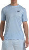 A man wears the Bullpadel Casinas Men's Padel T-Shirt in Glacier Blue, made from lightweight polyester with subtle diagonal lines, Quickerdry technology, and a small chest logo, paired with athletic shorts.
