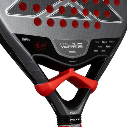 Close-up of the NOX ML10 Ventus Control 3K By Miguel Lamperti 2026 Padel Racket in grey and black with red accents, featuring circular holes, Miguel Lamperti's signature, and NOX branding—ideal for precision control play.