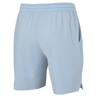 Tecnifibre Team Stretch Mens Padel Shorts in Glacier Blue, featuring an elastic waistband and side pockets. Shown from the back on a white background, the smooth and lightweight fabric is ideal for active sports.