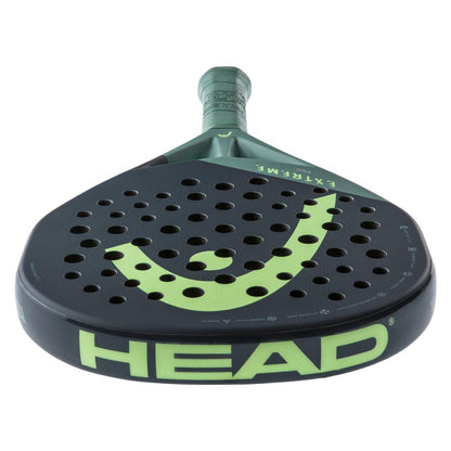 The HEAD Extreme Pro 2023 Padel Racket in green displays the word "HEAD" in bold green on the rim. It features a perforated surface with Auxetic technology and "EXTREME" printed on the neck, offering unparalleled performance.