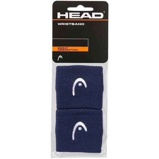 Package of two HEAD 2.5" Padel Wristbands in navy blue, crafted with nylon elastane for excellent sweat absorption, keeping your face dry. The packaging features a black and white design with an orange label showcasing the product's benefits.