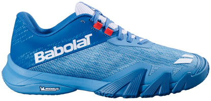 The Babolat Jet Viva Men's Padel Shoes in Blue Moon/Seaport feature a white side logo, red eyelets, textured mesh design, sturdy sole, and Michelin logo near the heel for lightweight padel performance.
