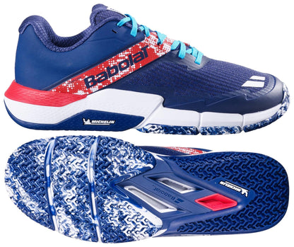 The Babolat Movea 2 Men's Padel Shoes in dark blue with chilli red and white accents feature turquoise laces, durable Michelin rubber soles with textured tread, and display the Michelin logo.