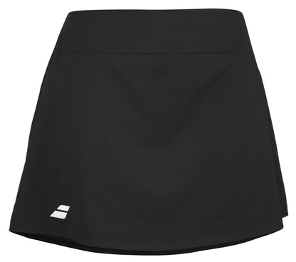 The Babolat Play Women's Padel Skirt in black is made from recycled polyester and sports a small white logo on the bottom left corner. This skirt offers a minimalist design with a smooth finish and slight flare at the hem, making it ideal for agile movements both on and off the court.