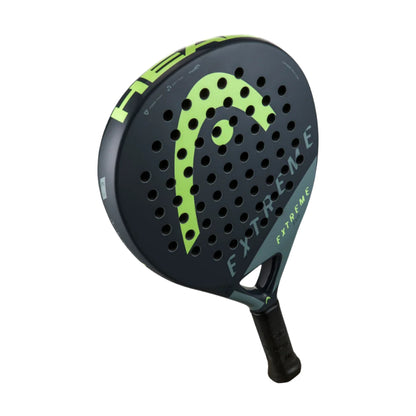 The HEAD Evo Extreme 2023 Padel Racket in black and green features Innegra technology and a perforated face for optimal spin and control. The bold "EXTREME" branding enhances its sleek, modern design with striking contrasting colors.