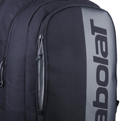 A close-up of the Babolat Court Hero Padel Backpack in black, showcasing the "Babolat" name vertically printed on the side. This eco-friendly backpack features multiple zippered compartments and dedicated racket storage to organize all your gear neatly.