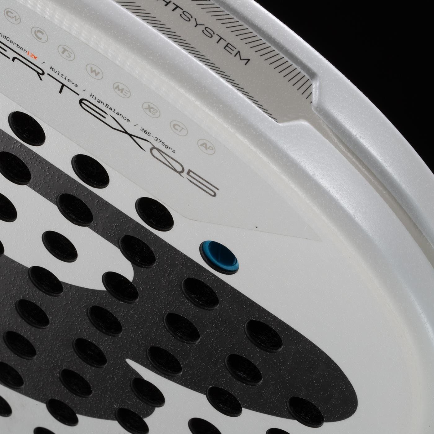 Close-up of the Bullpadel Pearl 2026 Padel Racket - White, a lightweight racket with perforated surface, blue hole, and branding along the edge. Its design stands out against a black background and aims to help prevent injury.