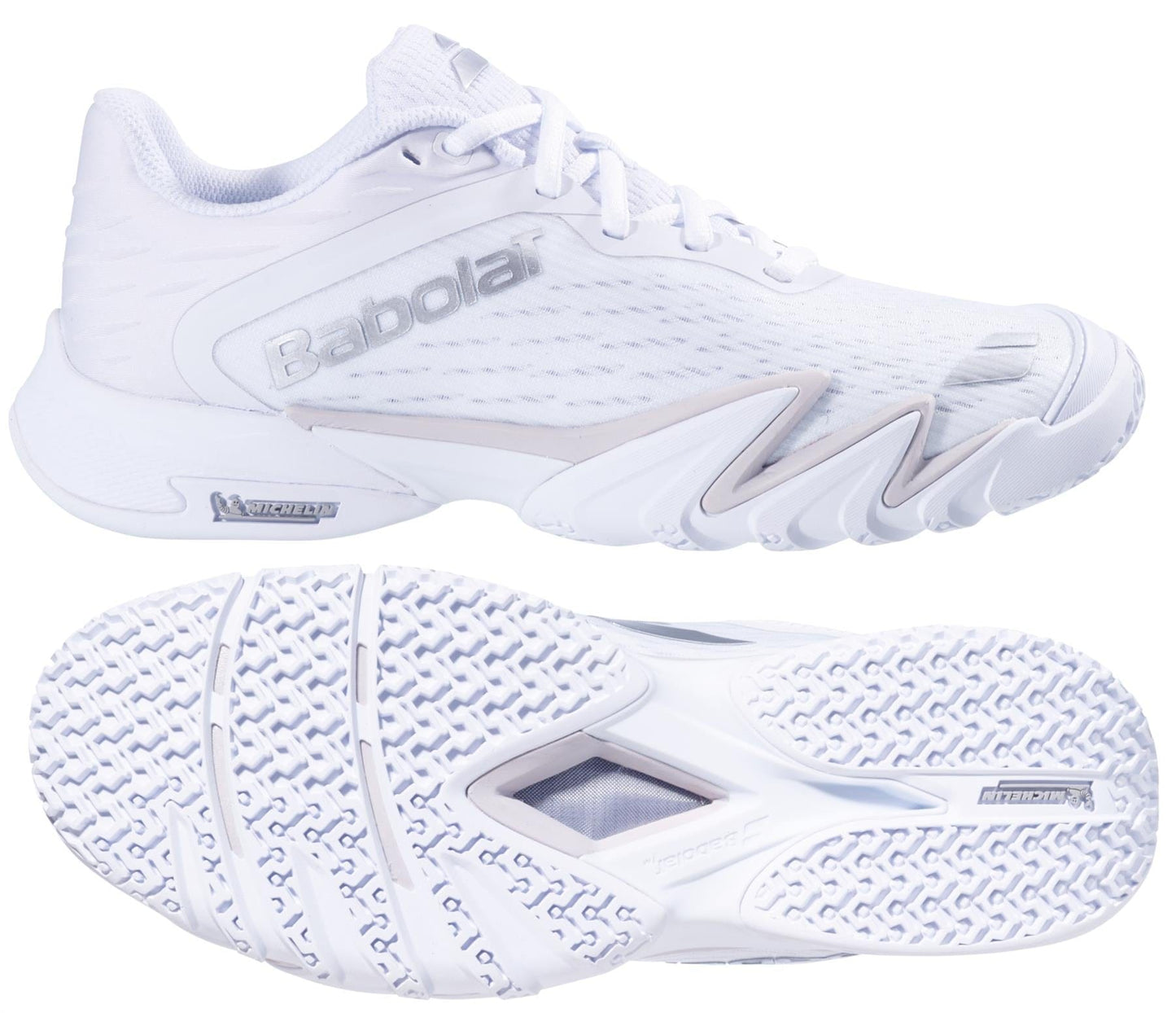 The Babolat Premura 3 Womens Padel Shoes in White/Silver are displayed from the side and sole, showcasing their textured grip pattern and the Babolat logo.