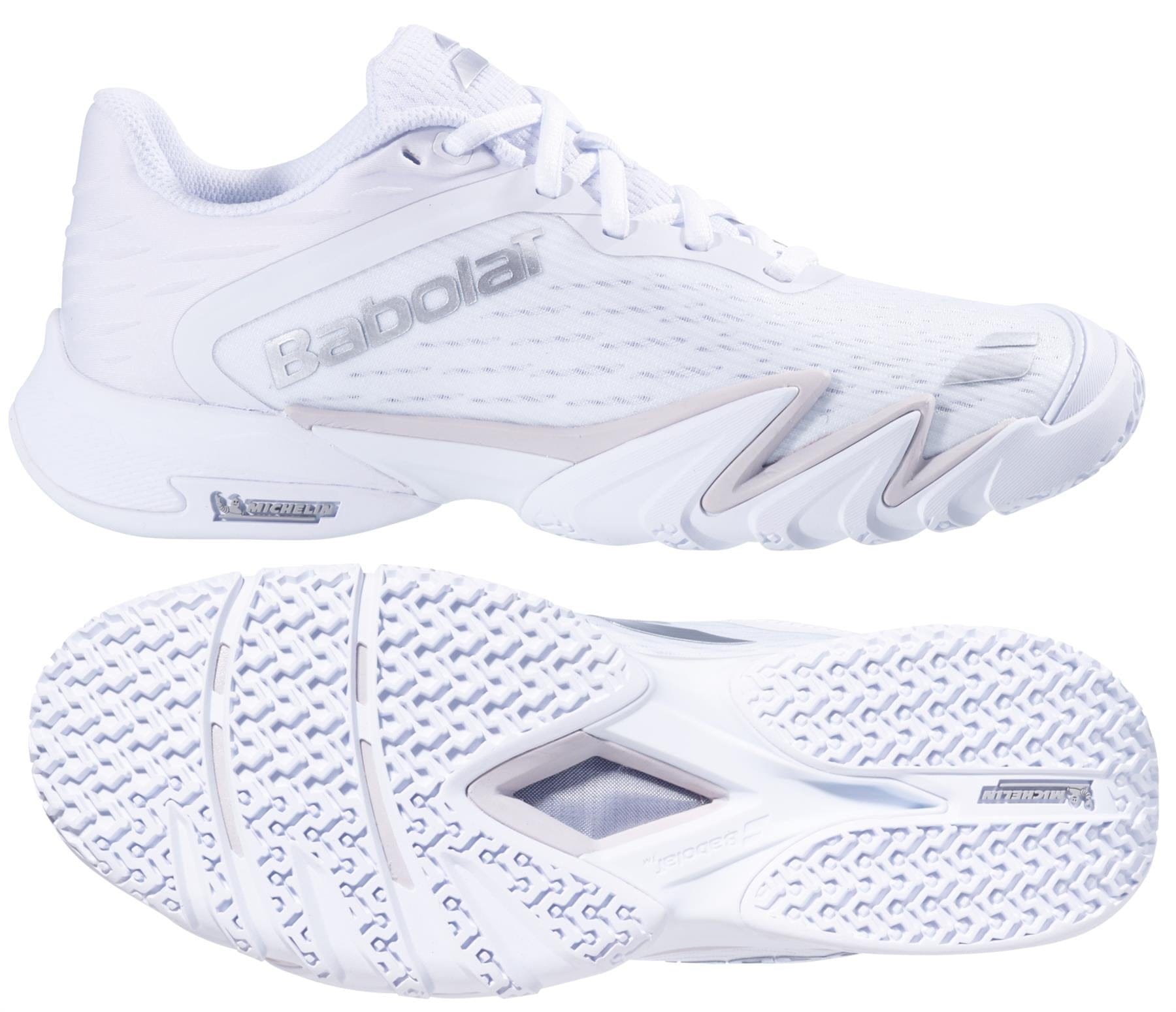 The Babolat Premura 3 Womens Padel Shoes in White/Silver are displayed from the side and sole, showcasing their textured grip pattern and the Babolat logo.