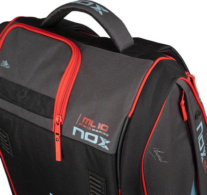 The NOX ML10 Competition XL Compact Padel Racket Bag in black and red features red zippers, a sturdy handle, mesh side ventilation, and "NOX" branding—perfect for stylishly carrying your gear.