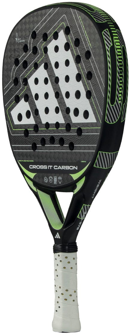 The adidas Cross It Carbon 2026 Padel Racket in black and green features a white grip, multiple circular holes in the head, and its name printed on the throat—an advanced-level carbon fibre racket.