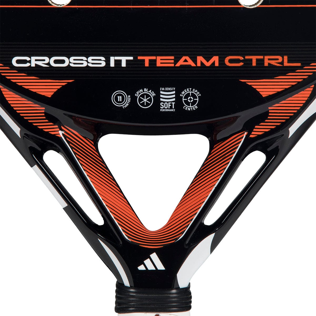 Close-up of the adidas Cross It Team Ctrl 2026 Padel Racket in black and orange, with "CROSS IT TEAM CTRL" text and icons for Spin Blade, Soft, Sweet Spot Center, and Extra Power Grip on its surface.