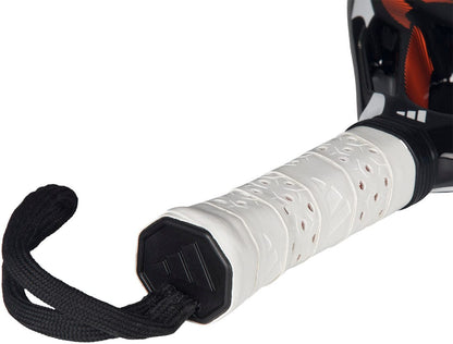 Close-up of the white grip and black wrist strap on the adidas Cross It Team Ctrl 2026 Padel Racket - Black / Orange, showing its Extra Power Grip's textured patterns and ventilation holes for added comfort.
