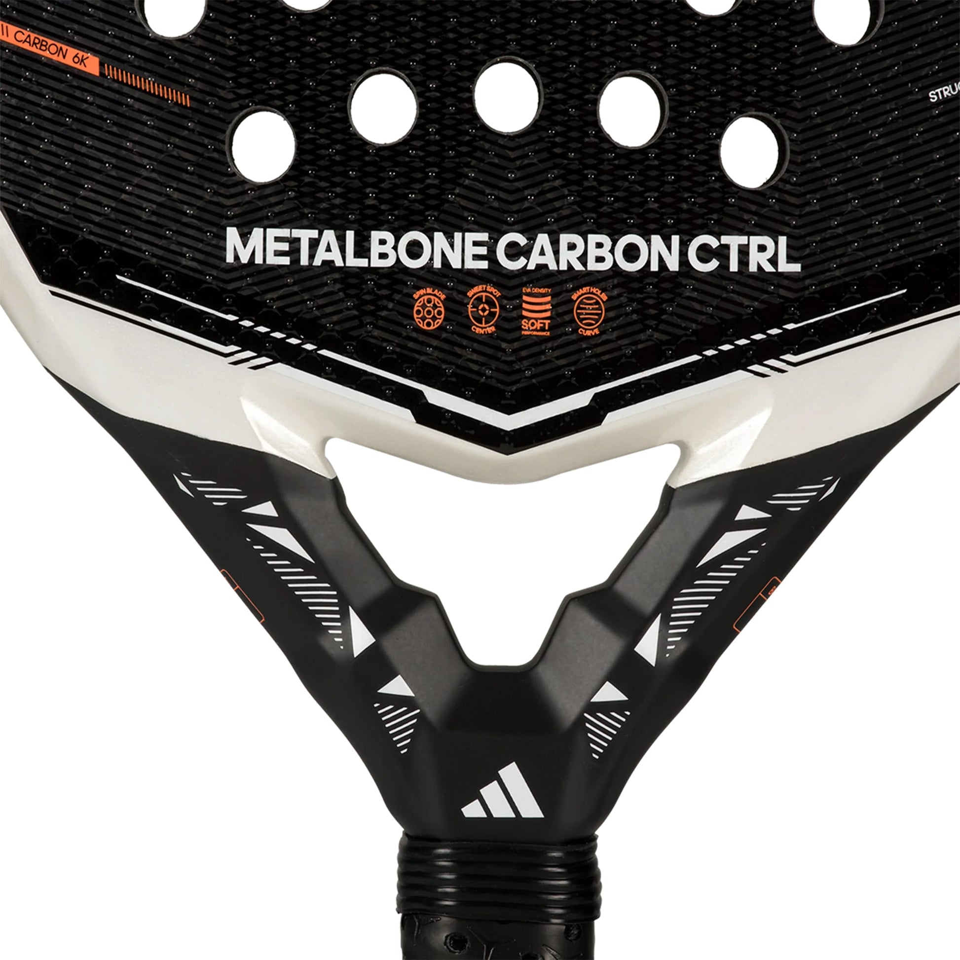 Close-up of the adidas Metalbone Carbon CTRL 2026 padel racket for advanced players, highlighting its textured surface, circular holes, and distinct adidas branding with icons near the handle.
