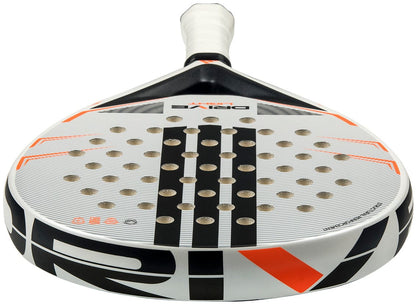 Close-up of the adidas Drive Light 2026 Padel Racket in white and orange, featuring a lightweight design, circular holes on the face, "DRIVE" text near the handle, and a white grip.