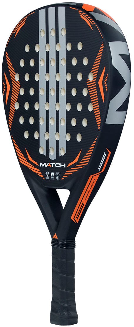 The adidas Match Black 2026 Padel Racket - Black / Orange features fibreglass construction, a black and orange perforated face with silver diagonal stripes, and a wrapped handle, shown upright on a white background.