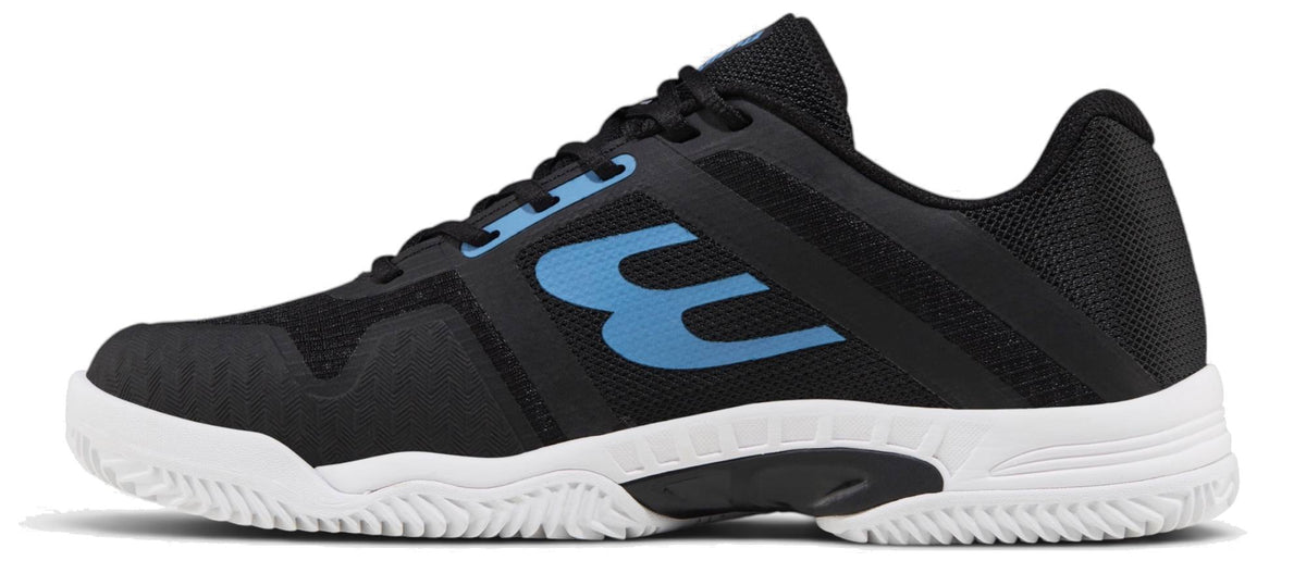 The Bullpadel Indiga 26I Mens Padel Shoes - Black feature a white sole, blue logo, black laces, textured grip, and curved arch details—ideal beginner padel shoes from Bullpadel for court support.