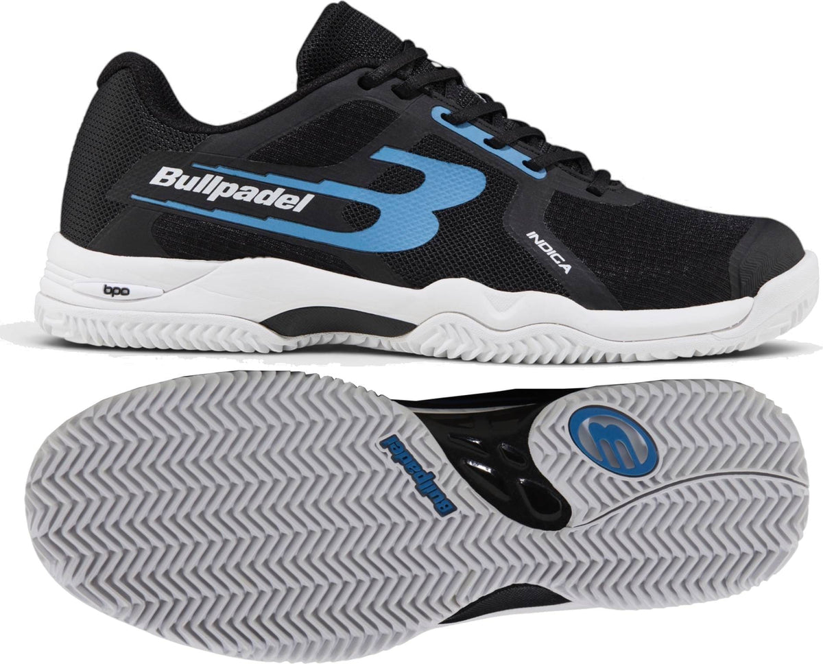 The Bullpadel Indiga 26I Mens Padel Shoes - Black are shown from the side and bottom, featuring blue and white accents, a bold tread pattern, and large “B” logo—ideal for quality padel court performance.