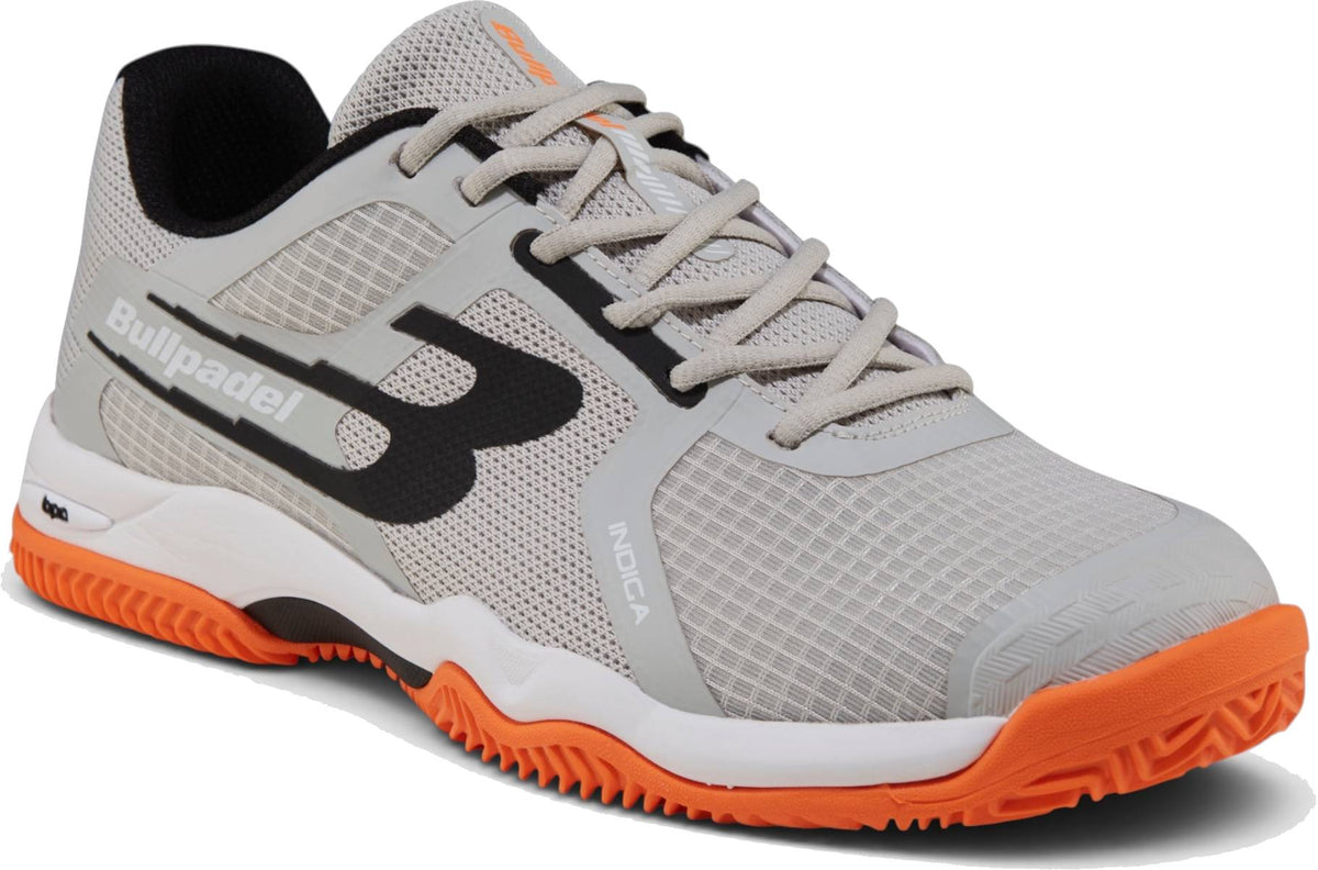 Bullpadel Indiga 26I Mens Padel Shoes - Orange feature a gray upper with black and orange accents, breathable mesh, a white and black side logo, herringbone outsole with orange tread, and gray laces.