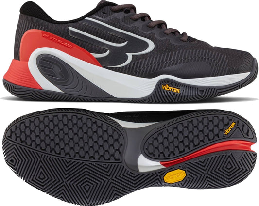 A black Bullpadel Vertex Vibram 26I Mens Padel Shoes - Asphalt with red, white, and gray accents, shown from side and bottom. The Vibram outsole has a textured pattern and yellow logos—perfect for padel play.