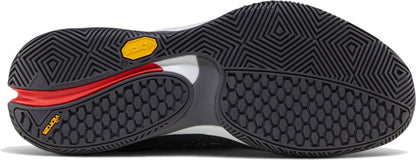Close-up of the Vibram outsole on the Bullpadel Vertex Vibram 26I Mens Padel Shoes - Asphalt, showing textured black and gray tread with red and yellow accents, designed for superior grip and stability.