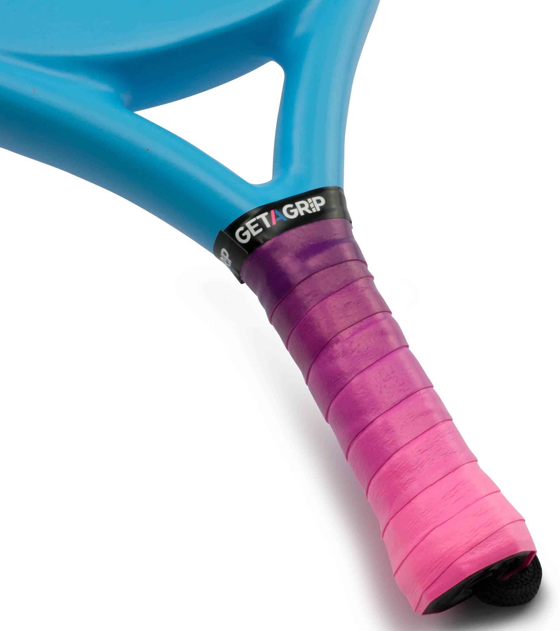 Close-up of a blue tennis racket fitted with the Get a Grip Padel Overgrip - Cascade from Get A Grip. The grip features a pink-to-purple gradient wrap and a black band near the handle top reading "GET A GRIP" in white.