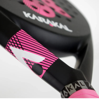 Close-up of a black Karakal Air Lite 345 Pink Padel Racket with pink accents and graphic patterns on the handle and head.