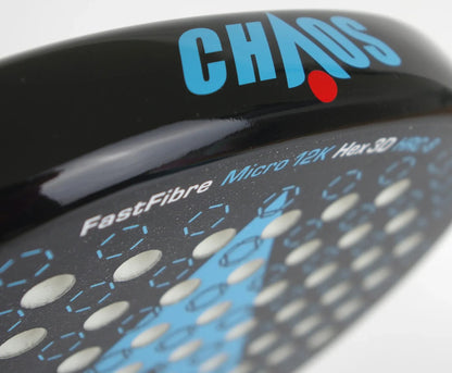 Close-up of a black Karakal Chaos Dynamic 2026 padel racket face, featuring the word “CHAOS” in blue text with a red dot, alongside printed technical specifications including “FastFibre” and “Micro 12K”.