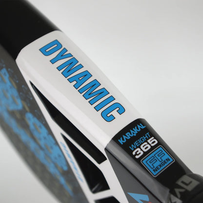 Close-up of a Karakal Chaos Dynamic 2026 padel racket frame showing “DYNAMIC” in blue text on a white bridge, with specifications reading “WEIGHT 365” and “FF NEXGEN” printed on the side.