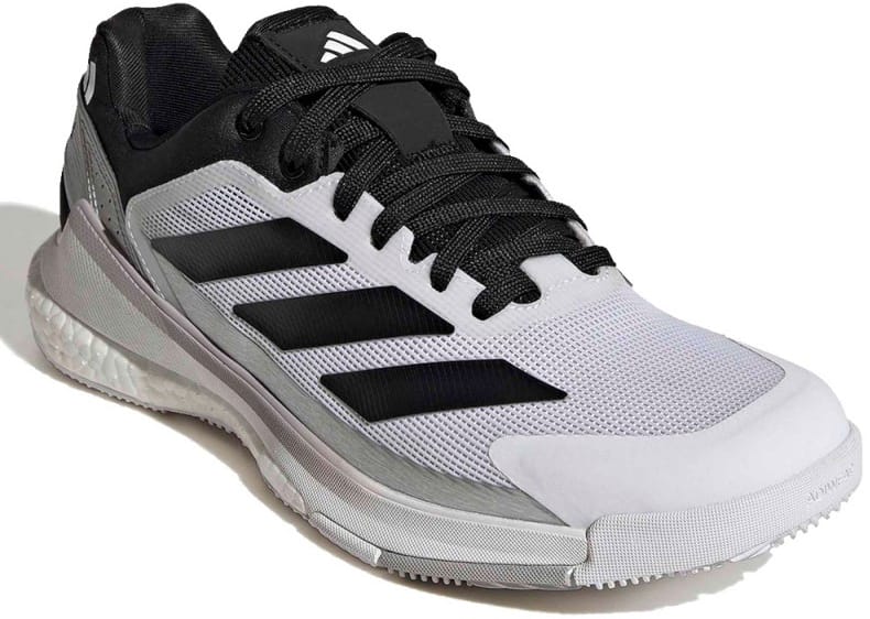 The ADIDAS Crazyquick Boost Mens Padel Shoes in Cloud White, Core Black, and Silver Metallic by adidas showcase a dynamic black-and-white design with black laces, signature three black stripes on the side, and a textured rubber sole engineered for exceptional energy return—an ideal choice for those in search of high-performance men's padel footwear—photographed against a plain white background.