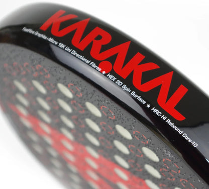 Close-up of the Karakal Chaos Shredder 2026 padel racket edge, featuring the brand name in red, FastFibre Graphite, 18K Uni Directional Fibres, a HEX 3D Spin Surface, and an HRC-Hi Rebound Core-10.