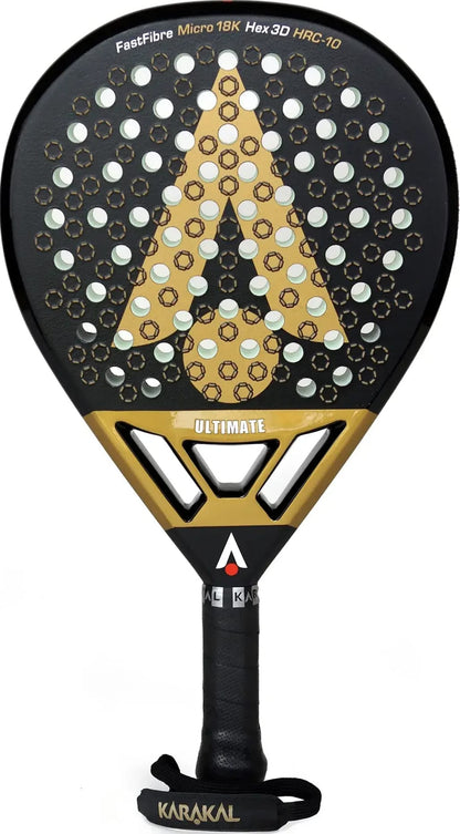 Black and gold teardrop-shaped Karakal Chaos Ultimate 2026 padel racket with a perforated head featuring a geometric logo, 18K carbon graphite text, and a handle with a wrist strap.