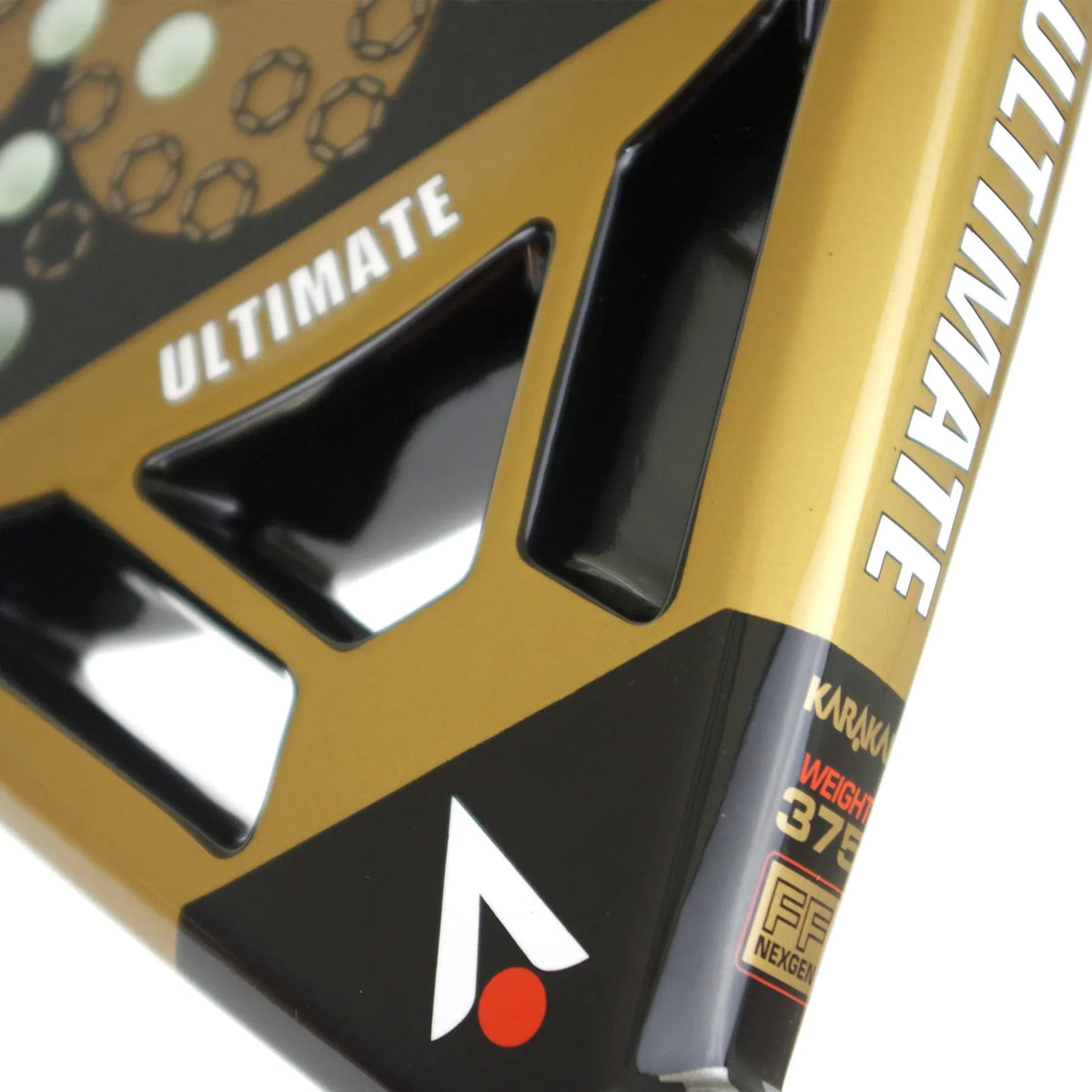 Close-up of a Karakal Chaos Ultimate 2026 padel racket, featuring gold and black 18K carbon graphite panels, a large triangular cutout, and technical text including the 375-gram weight.