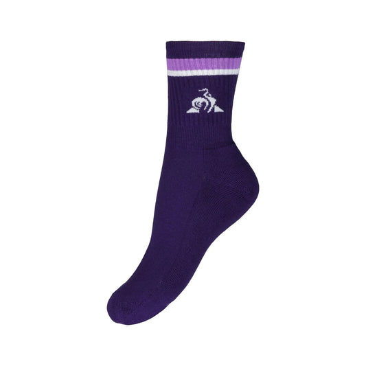 This single purple sock from the Le Coq Sportif Sports Socks - Purple Velvet collection showcases a white cyclist emblem. It includes two light purple stripes near the top and provides exceptional comfort and breathability for any adventure.