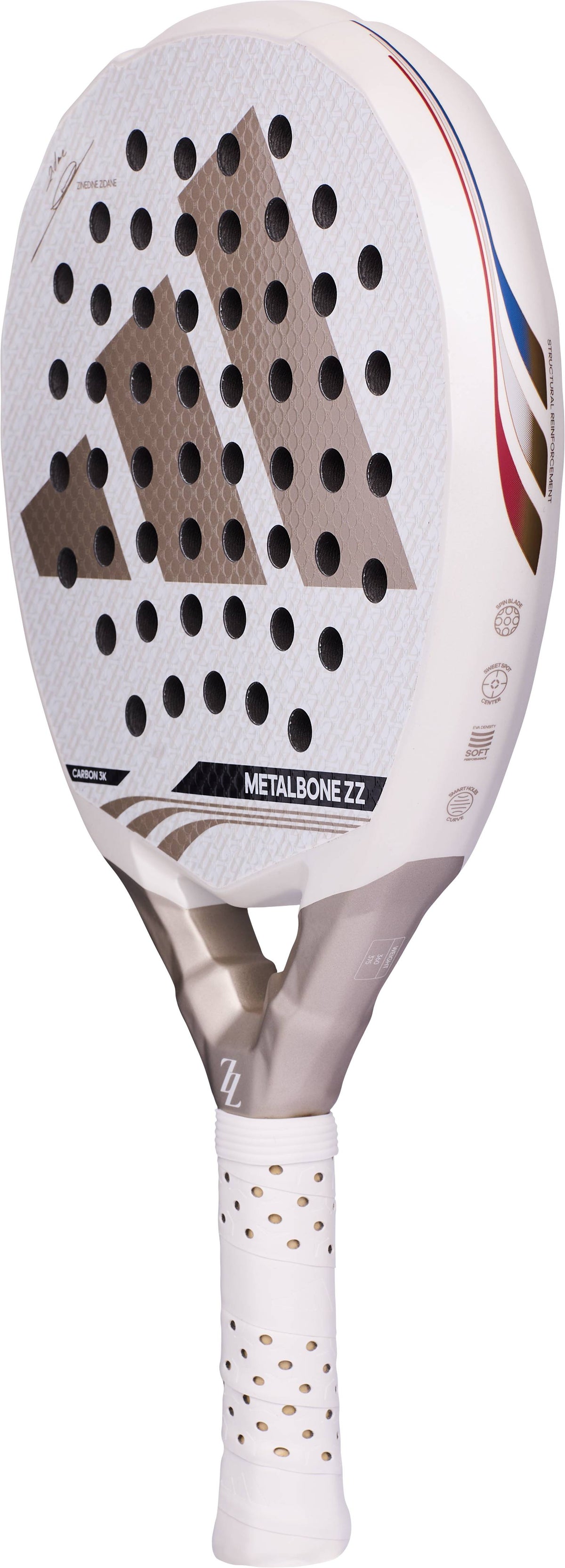 White and grey ADIDAS Metalbone ZZ Carbon Zinedine Zidane 2026 padel racket featuring a perforated surface, gold-toned logo, and a white grip handle.