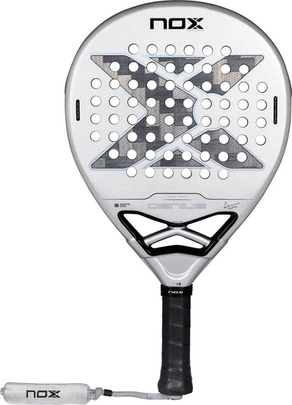 Silver and black NOX AT10 Genius 12K Alum Xtrem By Agustín Tapia 2027 padel racket with a perforated surface, featuring a large gray X pattern in the center and a black handle with a matching wrist strap.