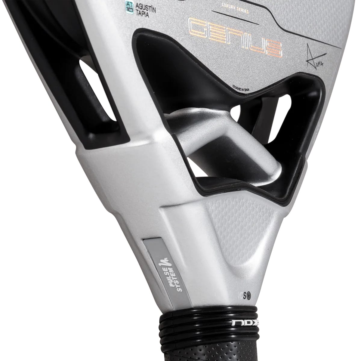 Close-up of the silver NOX AT10 Genius 12K Alum Xtrem By Agustín Tapia 2027 padel racket neck and handle, featuring black grip tape and text that reads “Genius” and “Pulse System.”
