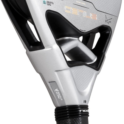 Close-up of the silver NOX AT10 Genius 12K Alum Xtrem By Agustín Tapia 2027 padel racket neck and handle, featuring black grip tape and text that reads “Genius” and “Pulse System.”